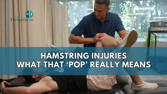 Athlete holding the back of their thigh after a hamstring injury during a sprint.