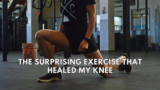 Physical therapist demonstrating a gentle knee recovery exercise on a mat.