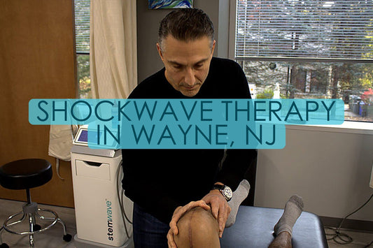Dr. Rob Letizia, PT, DPT treating a patient's knee with shockwave therapy at Spectrum Therapeutics in Wayne, NJ, titled “Shockwave Therapy In Wayne, NJ”
