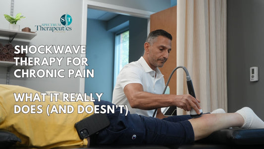 Physical therapist applying shockwave therapy to a patient’s foot to treat chronic plantar fasciitis pain.