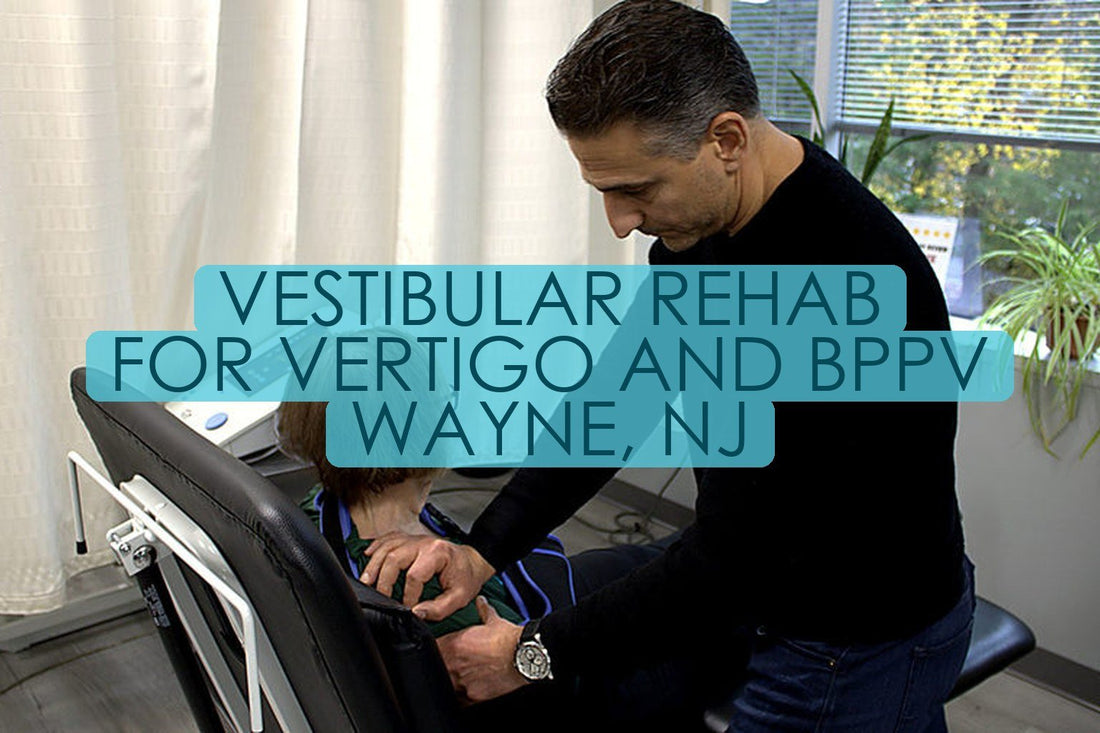 Dr. Rob Letizia, PT, DPT performing hands-on manual therapy on a seated patient at Spectrum Therapeutics in Wayne, NJ, titled “Vestibular Rehab For Vertigo And BPPV Wayne, NJ”